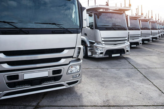Trucks lined up outside a facility